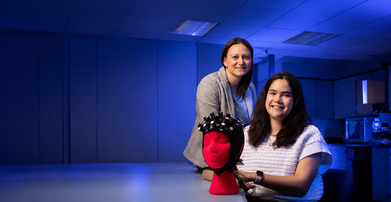 Inspiring a Greater Purpose A photo of a student with a faculty member.